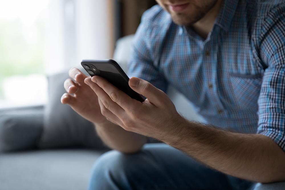 A person looking at a phone