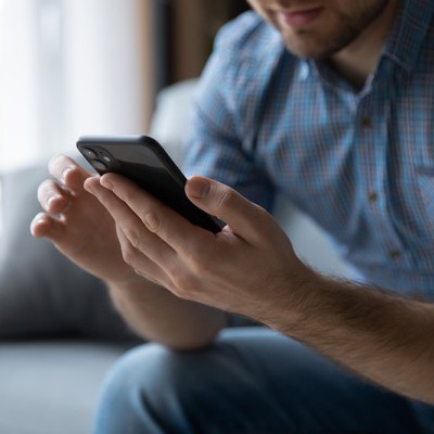 A person looking at a phone