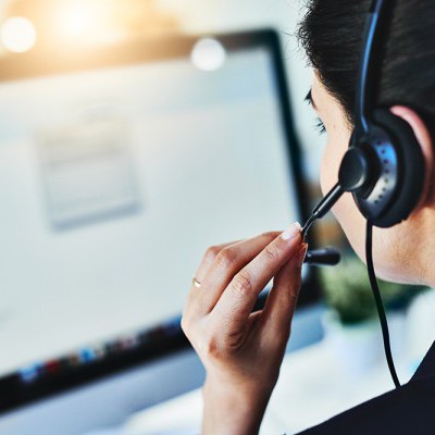 Person using a headset.